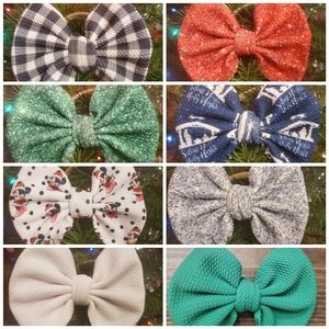 Bows on nylon or alligator clip